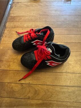 OTTO Kids Black Soccer Cleats with Red Accents